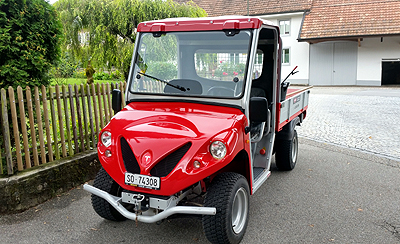 Swiss utility EV with Tesla hood emblem